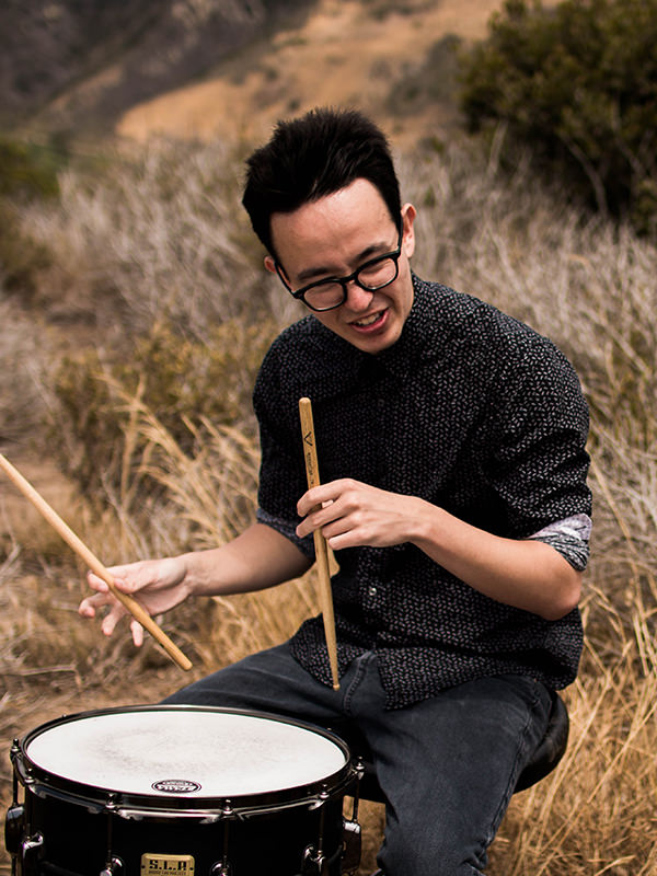 Man Playing Drums